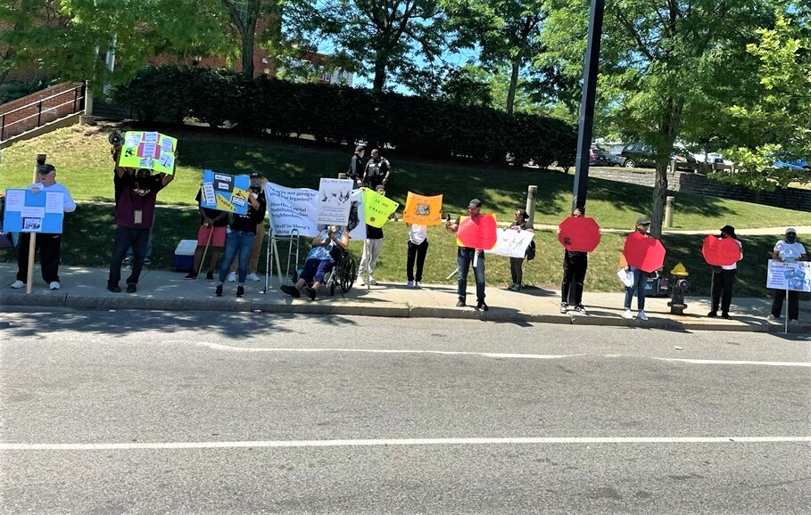 Protesters Rally At BlueHub Capital Headquarters